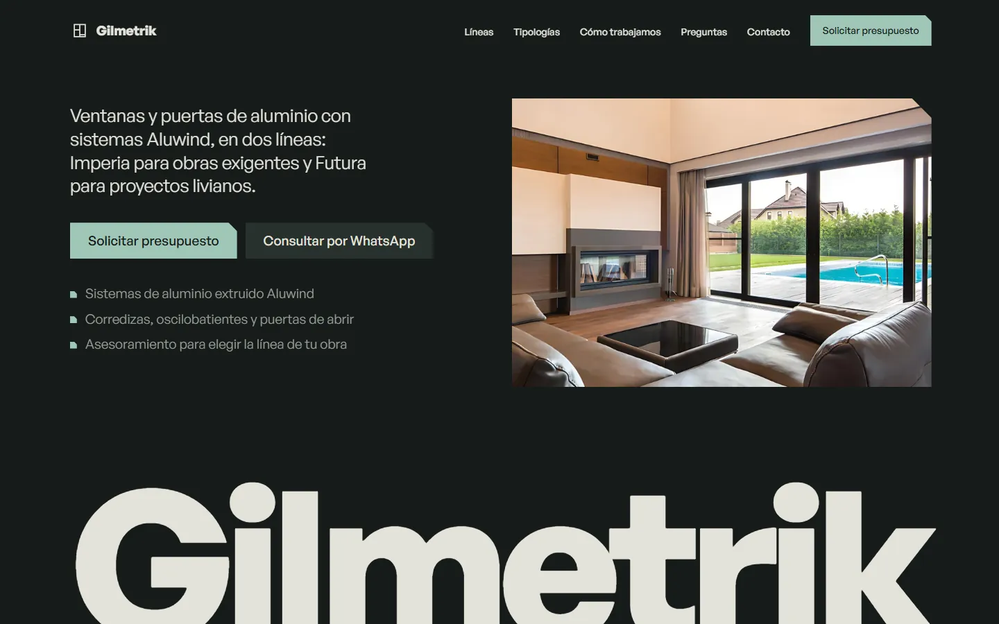 Portada del sitio de Gilmetrik: texto sobre aberturas de aluminio junto a la foto de un living con ventanales corredizos